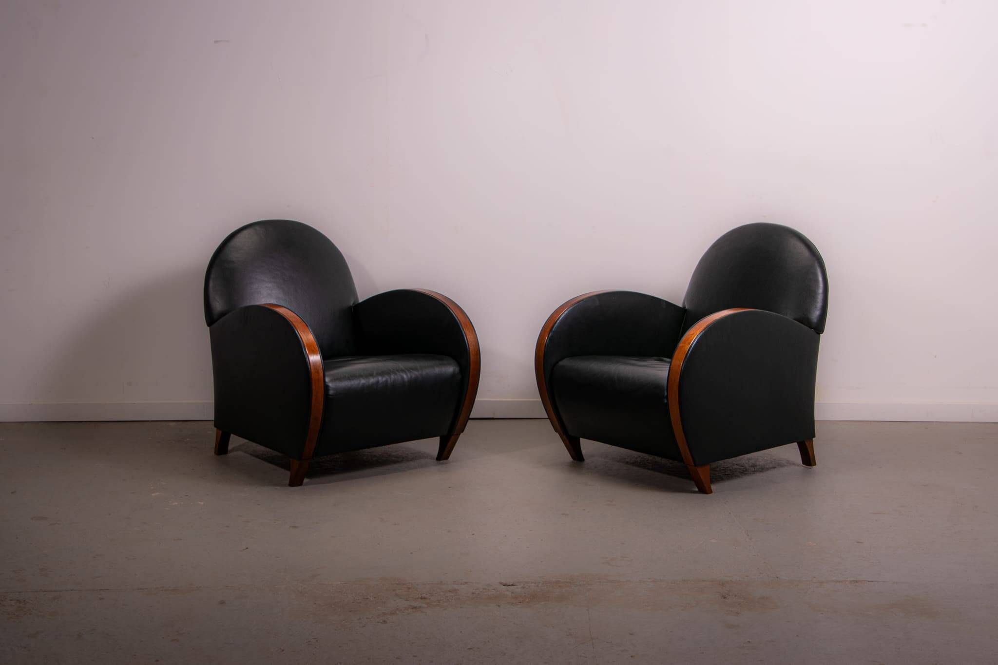 Pair of mid-century leather armchairs, circa 1970, made in Belgium.