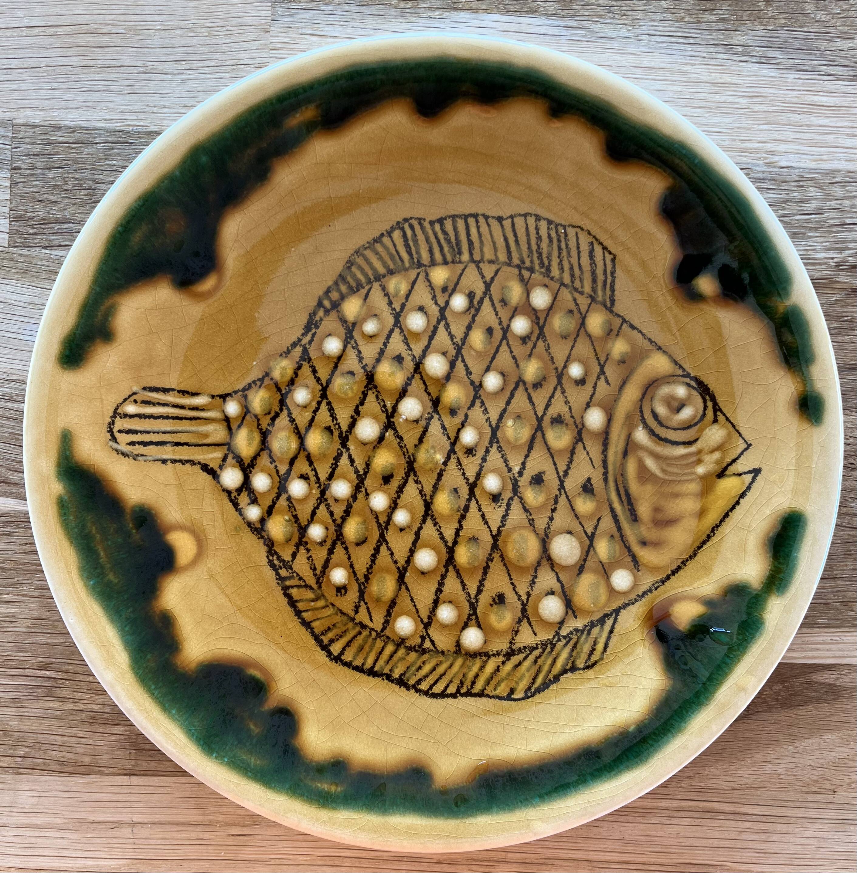 Ensemble de 12 assiettes de la série "Poisson" de Longchamp