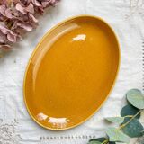 Vintage oval dish in ochre French earthenware from the 70s