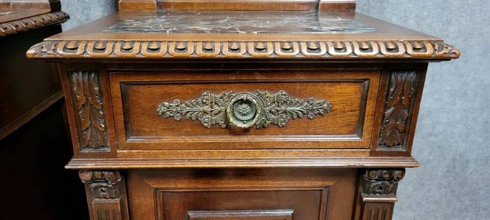 Pair of Renaissance style bedside tables in carved walnut, 19th century