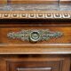 Pair of Renaissance style bedside tables in carved walnut, 19th century
