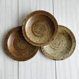 3 rustic stoneware plates, brown and beige speckled finish.