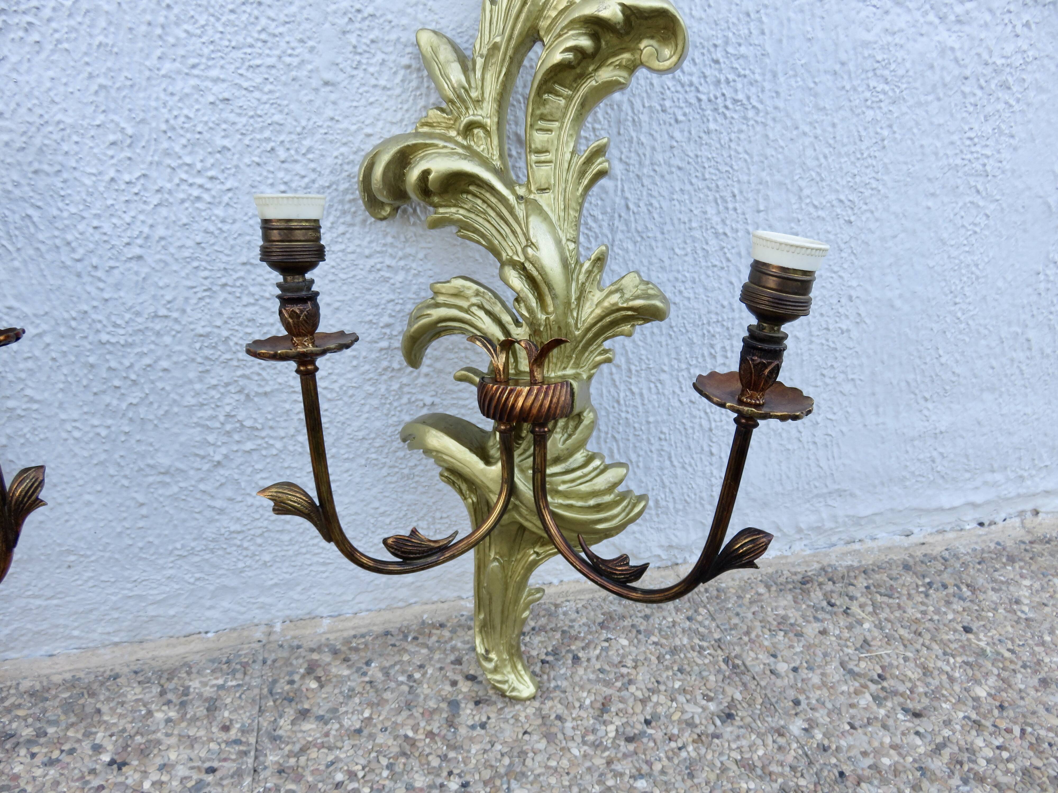 Pair of 86cm castle sconces in gilded wood from the 1940s