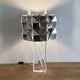 Lampe cinétique. 1980. Plexiglas et inox chromé