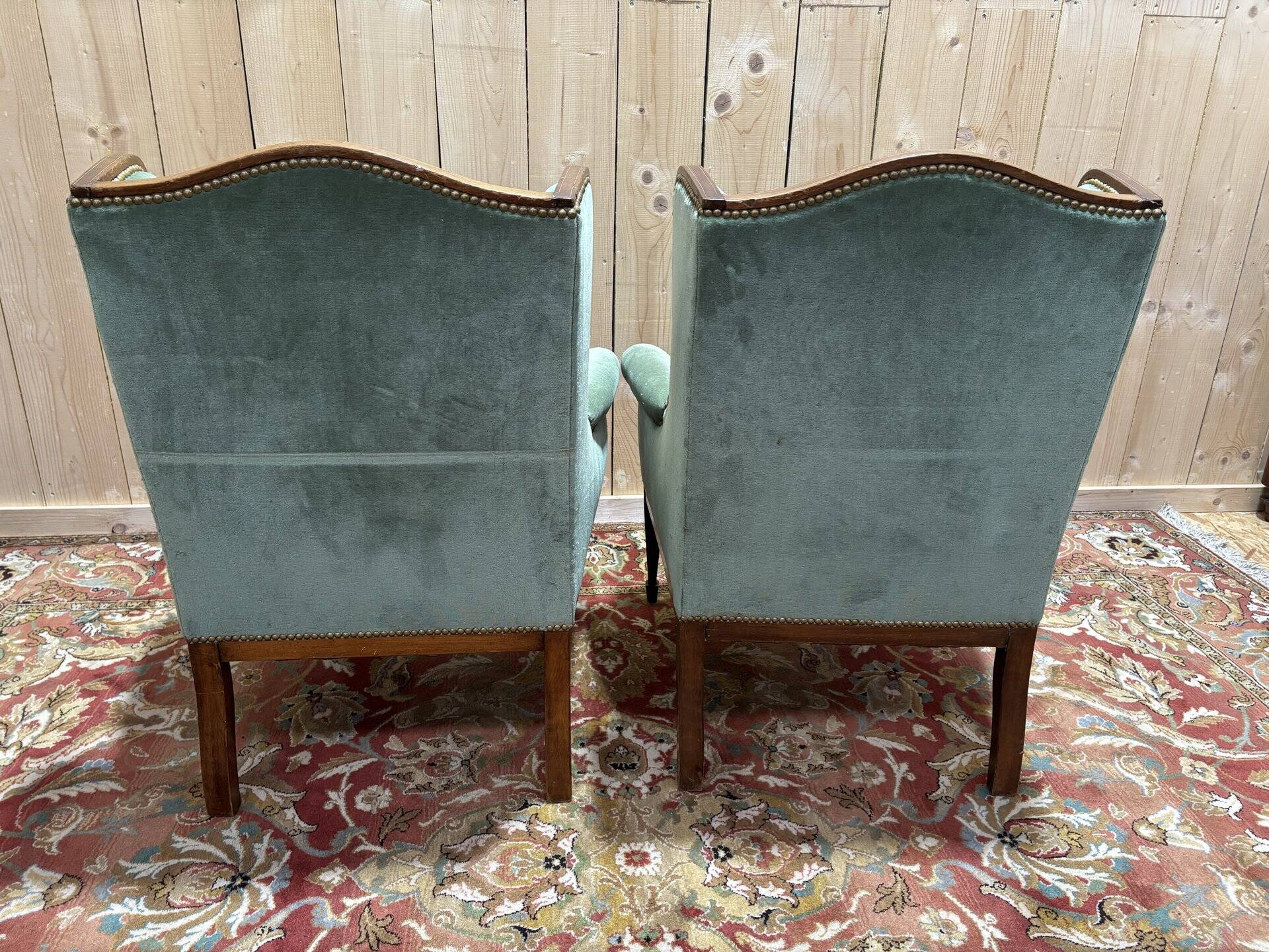 Pair of Louis XVI style wingback armchairs