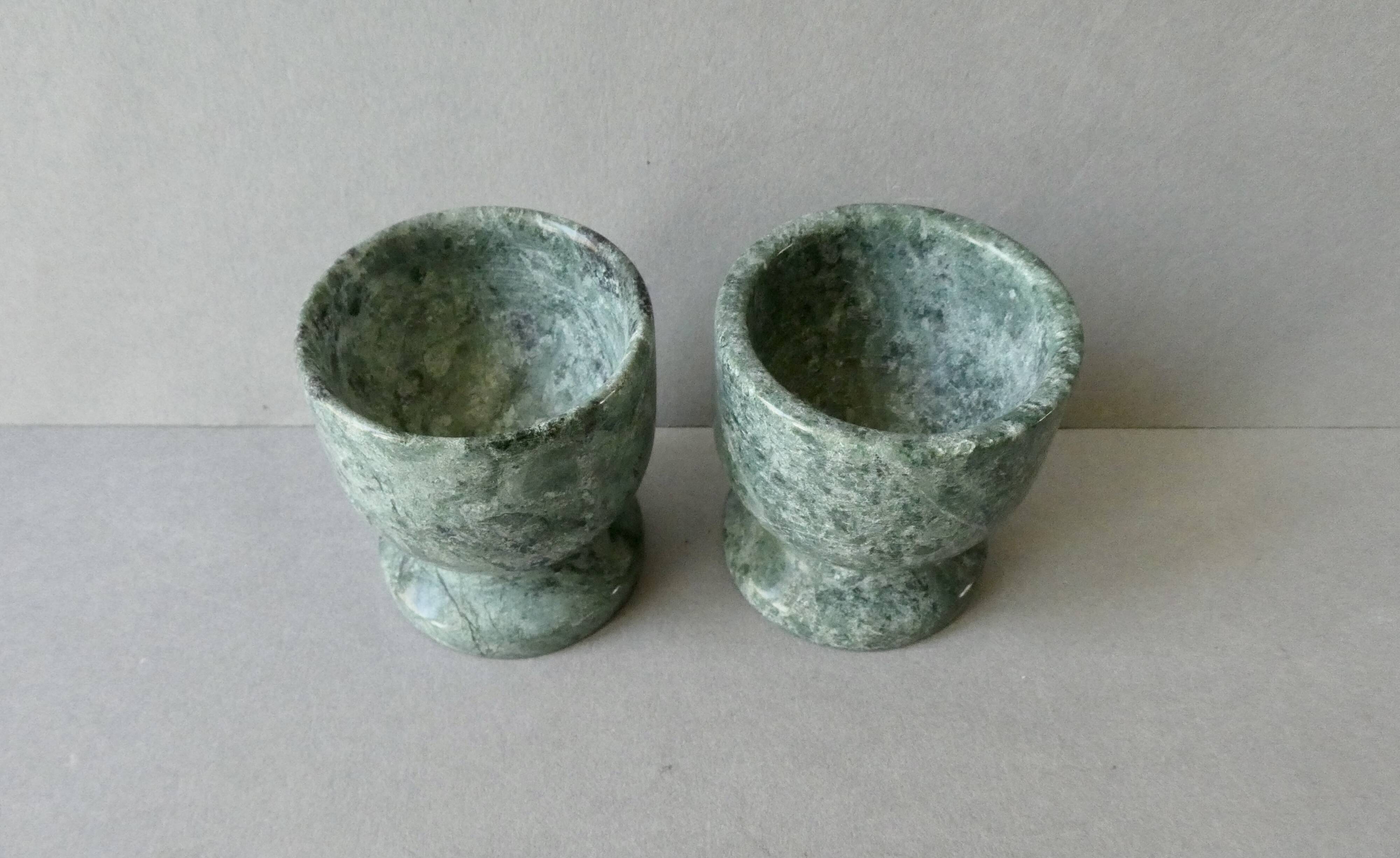 2 marble egg cups in veined white and green, circa 1980.
