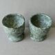 2 marble egg cups in veined white and green, circa 1980.