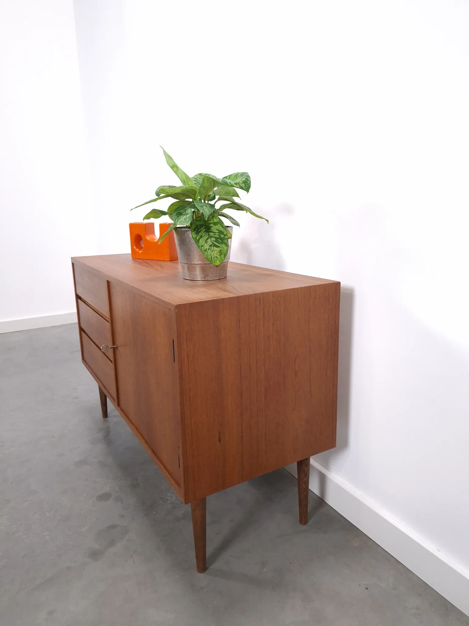 Vintage teak cabinet from the 1960s, sideboard with 3 drawers and a door.