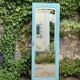 Beveled mirror on turquoise Parisian door