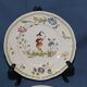 Pair of plates Moustiers décor to musician