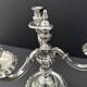 Pair of Chrysalia three-light silver-plated metal candlesticks