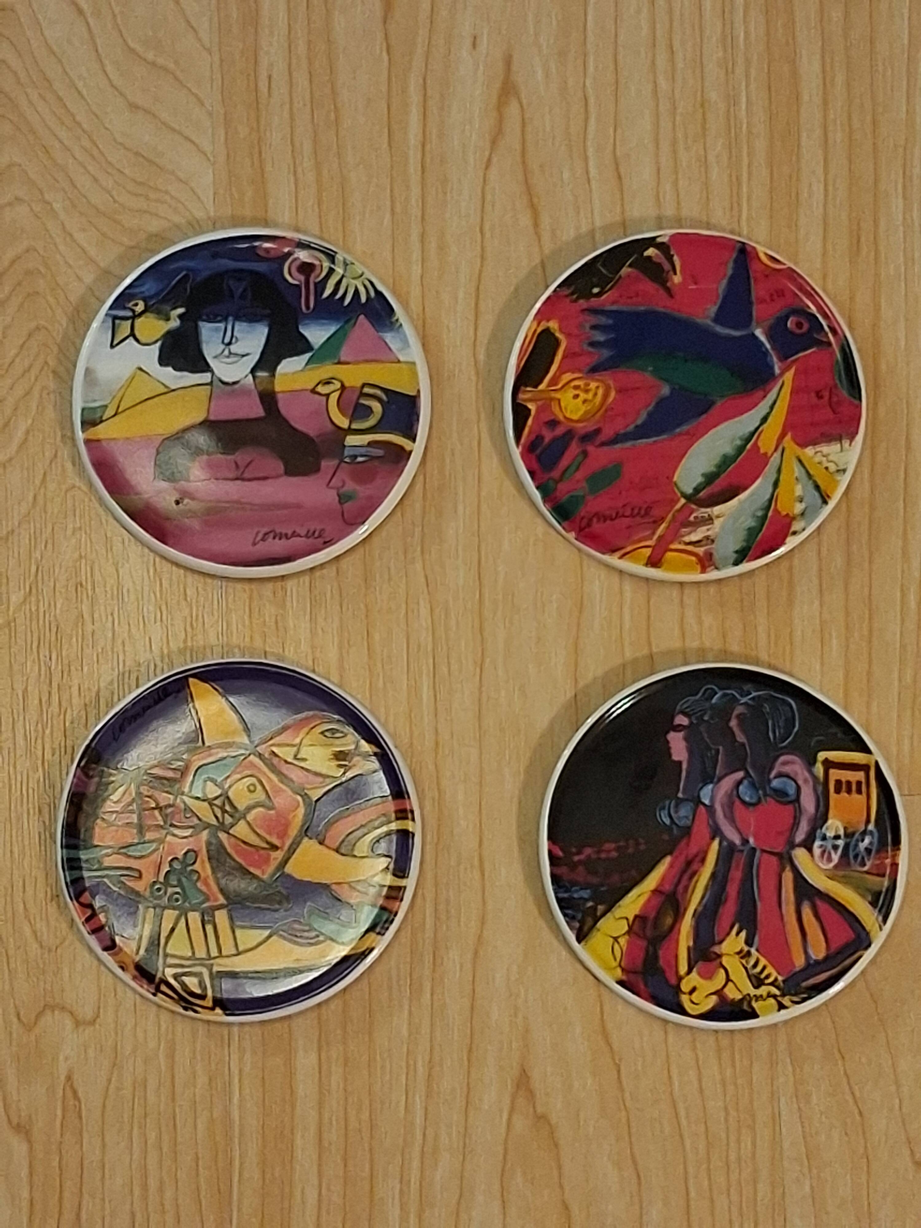 Coasters by the artist Guillaume Cornelis, known as Corneille, from 2001.