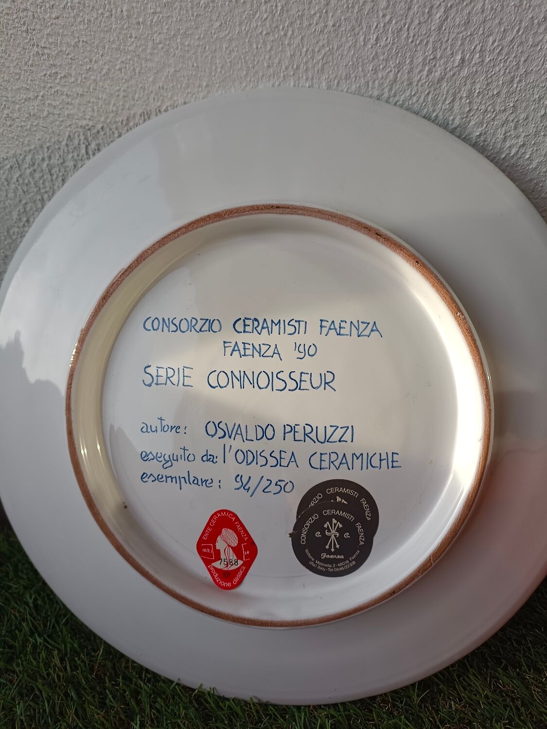 Osvaldo Perruzzi designer of polychrome faience plates.