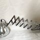 Vintage accordion wall light in chrome metal.