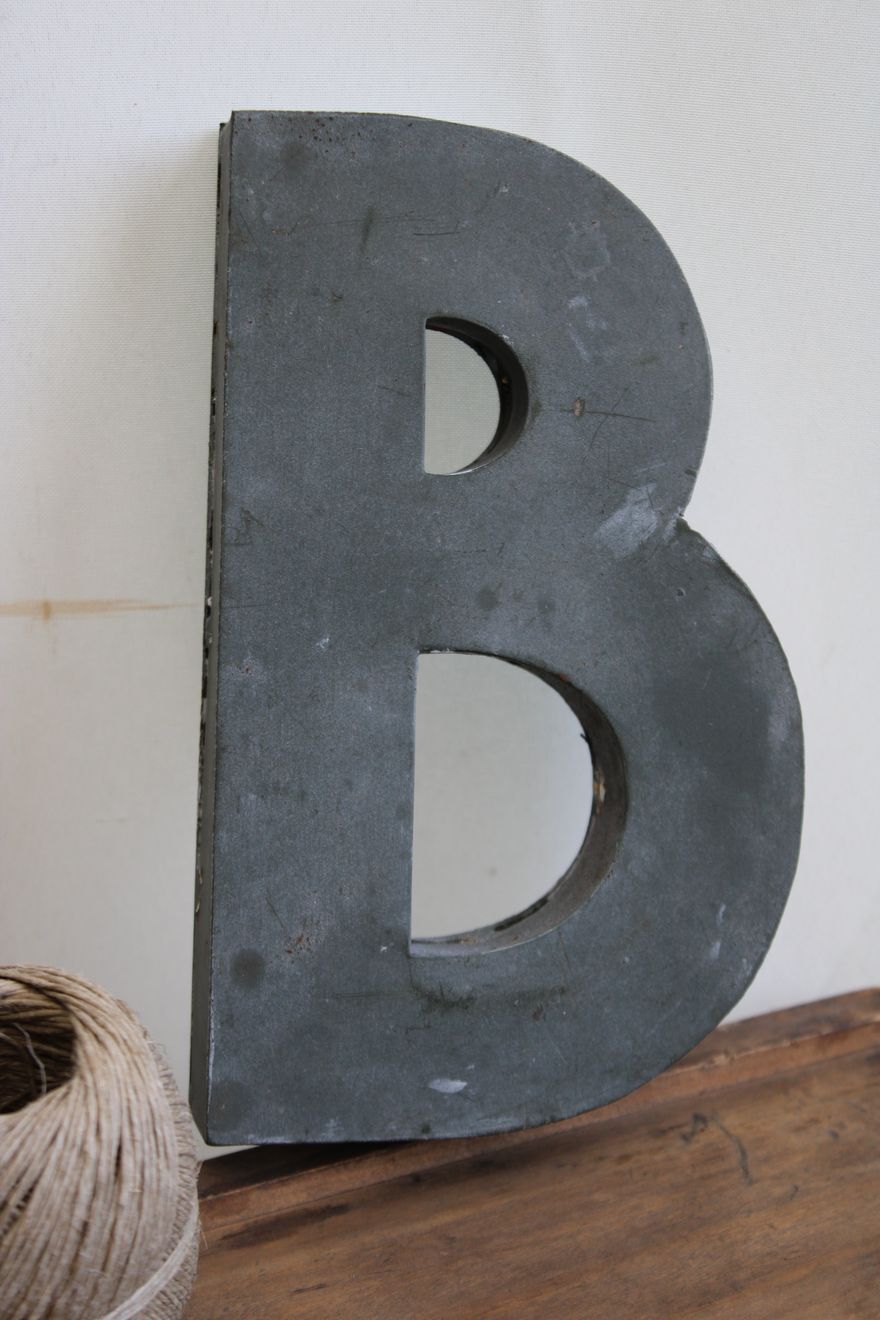 Letter of sign in zinc