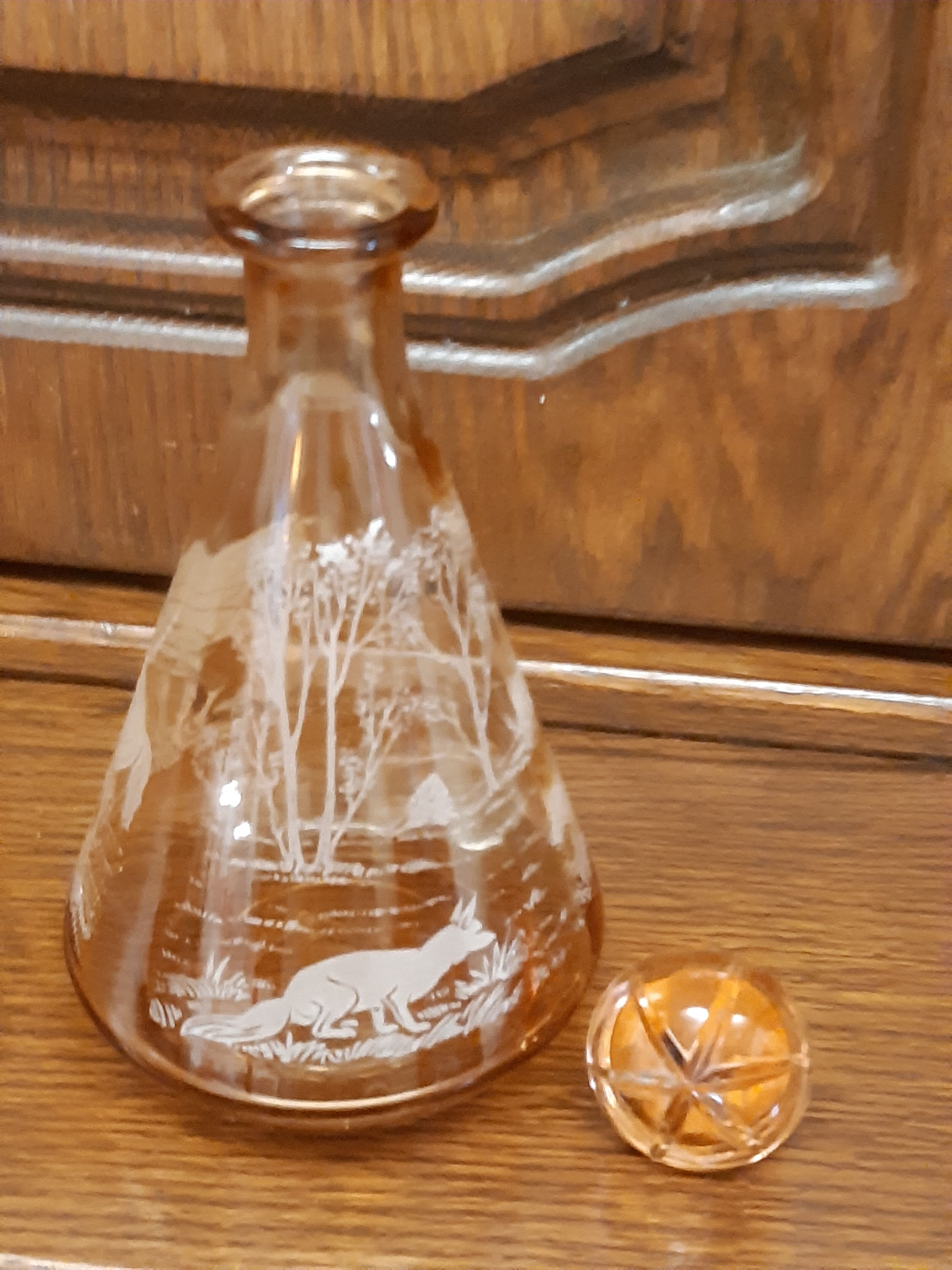 Moulded blown glass decanter with equestrian fox hunting décor, belle époque