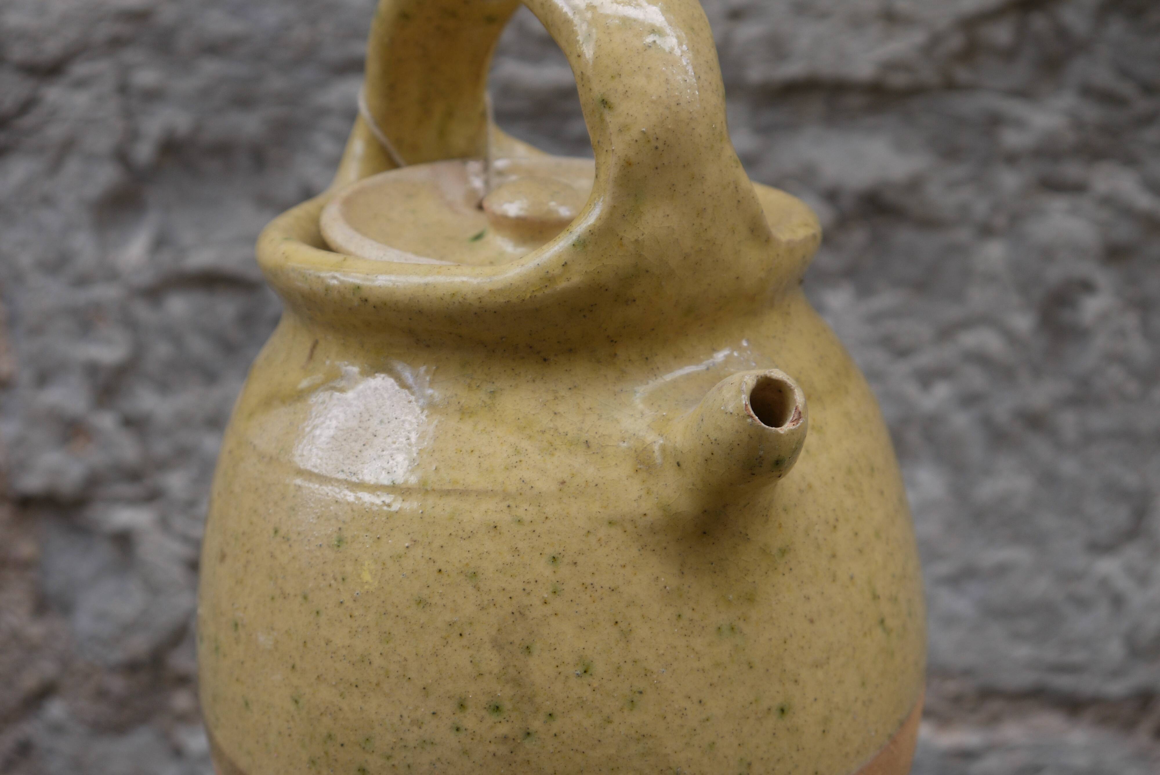 Terracotta jug gargoyle