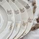 7 vintage porcelain soup plates Digoin Sarreguemines model Raphael with golden flower motif