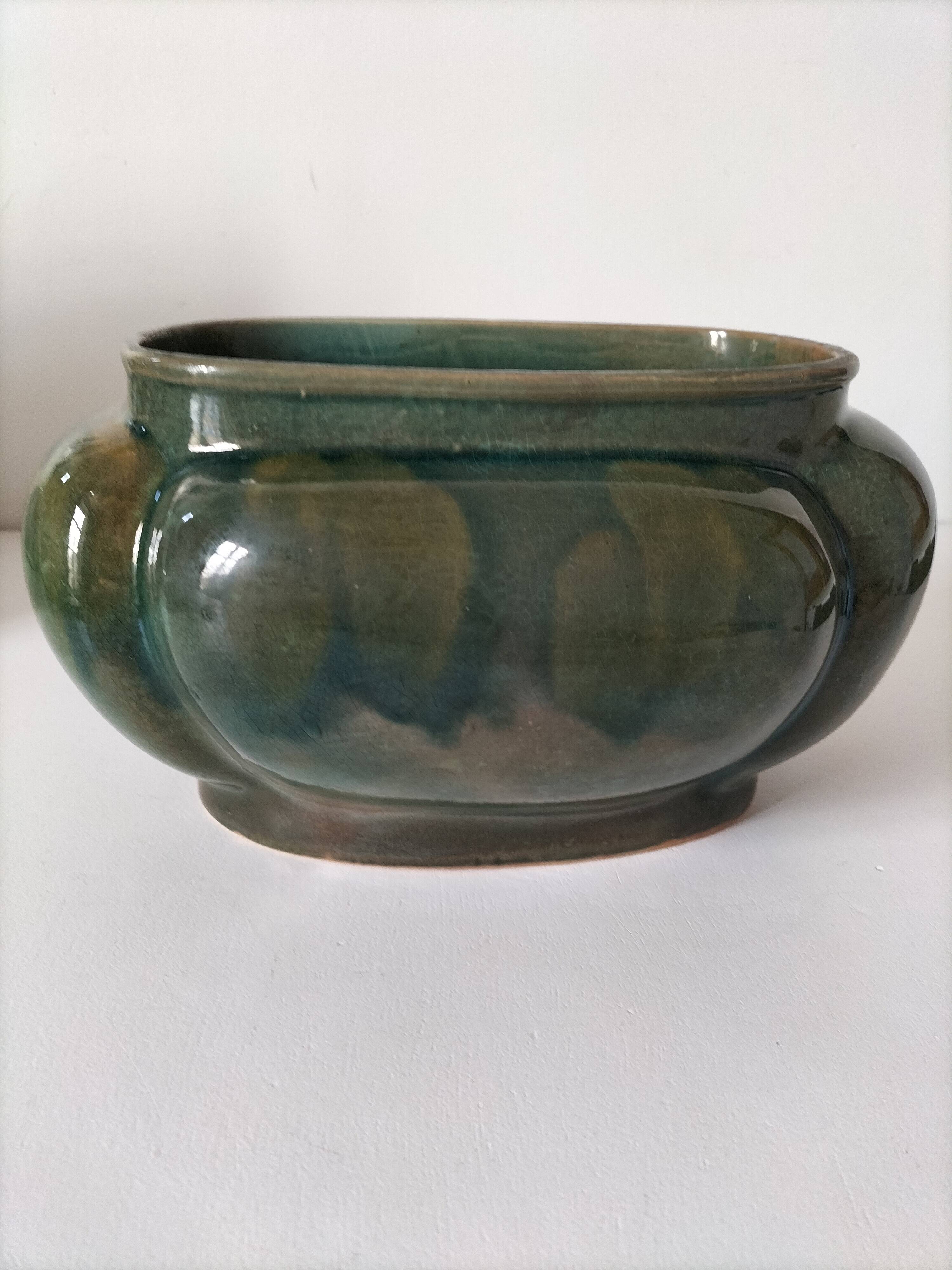 Art Deco flared cache-pot in turquoise glazed earthenware.