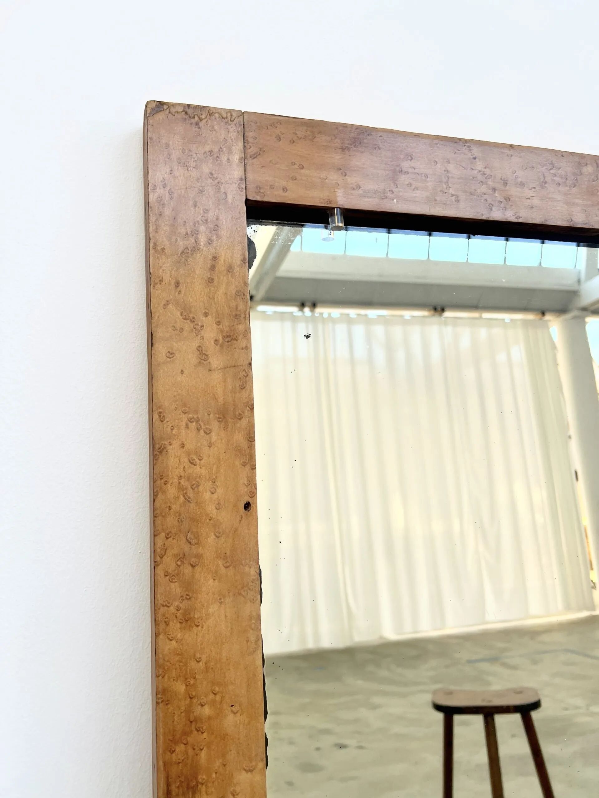 Antique mirror on an elm wardrobe door