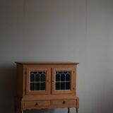 20th-century solid oak display cabinet with a glass front, by a Danish cabinetmaker.