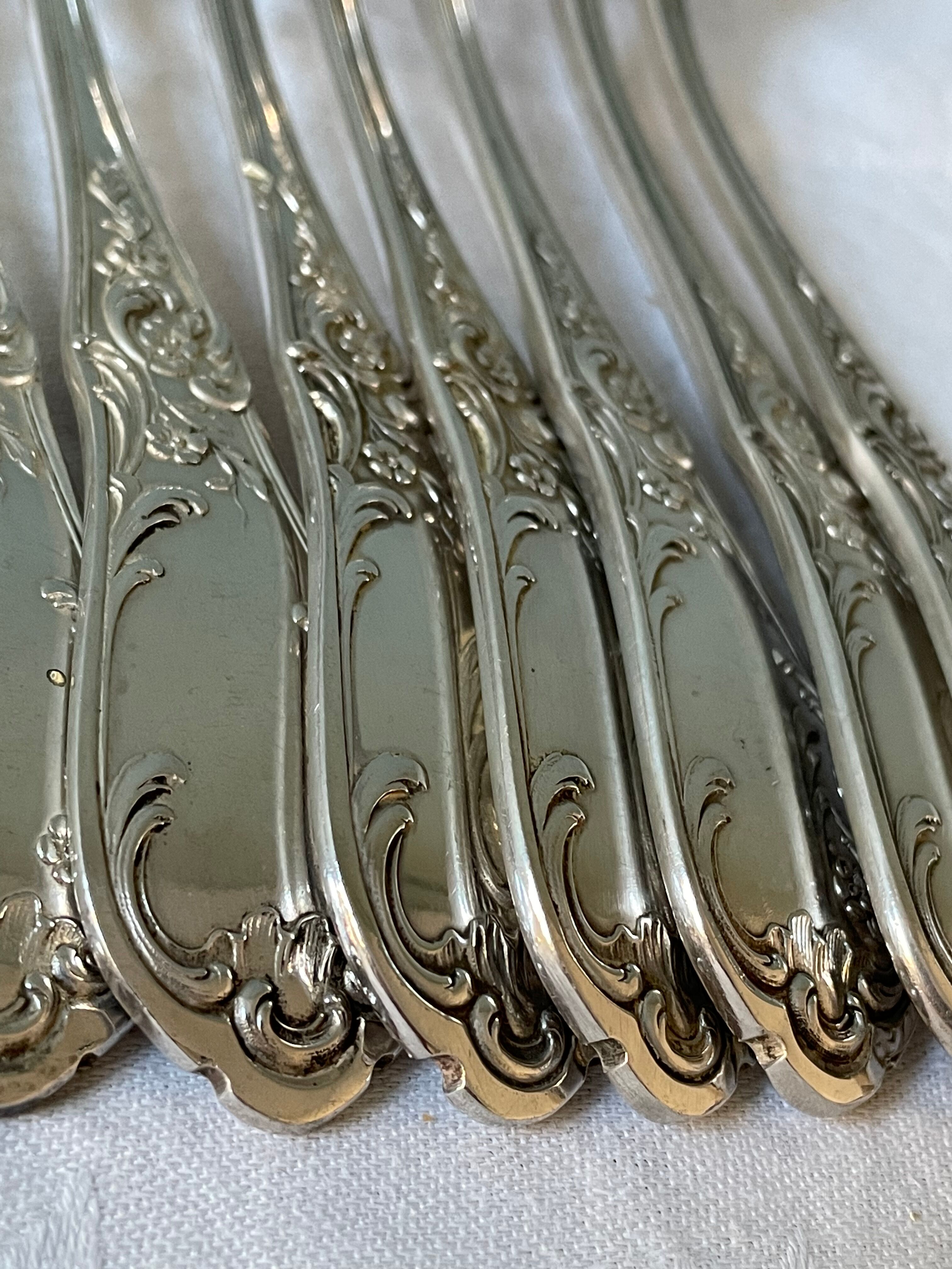 Series of 21 antique silver metal table forks