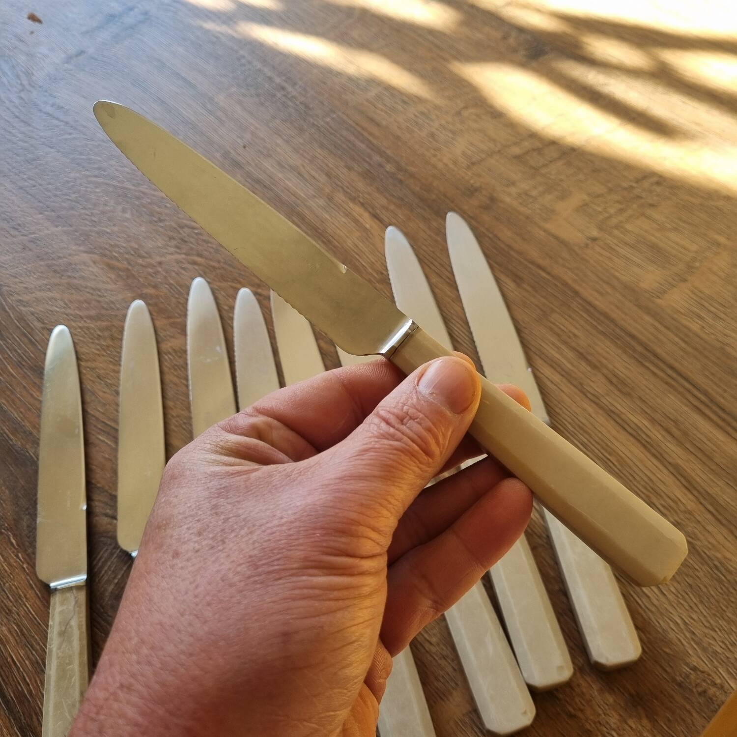 9 knives with bakelite handles, stainless steel, 1950