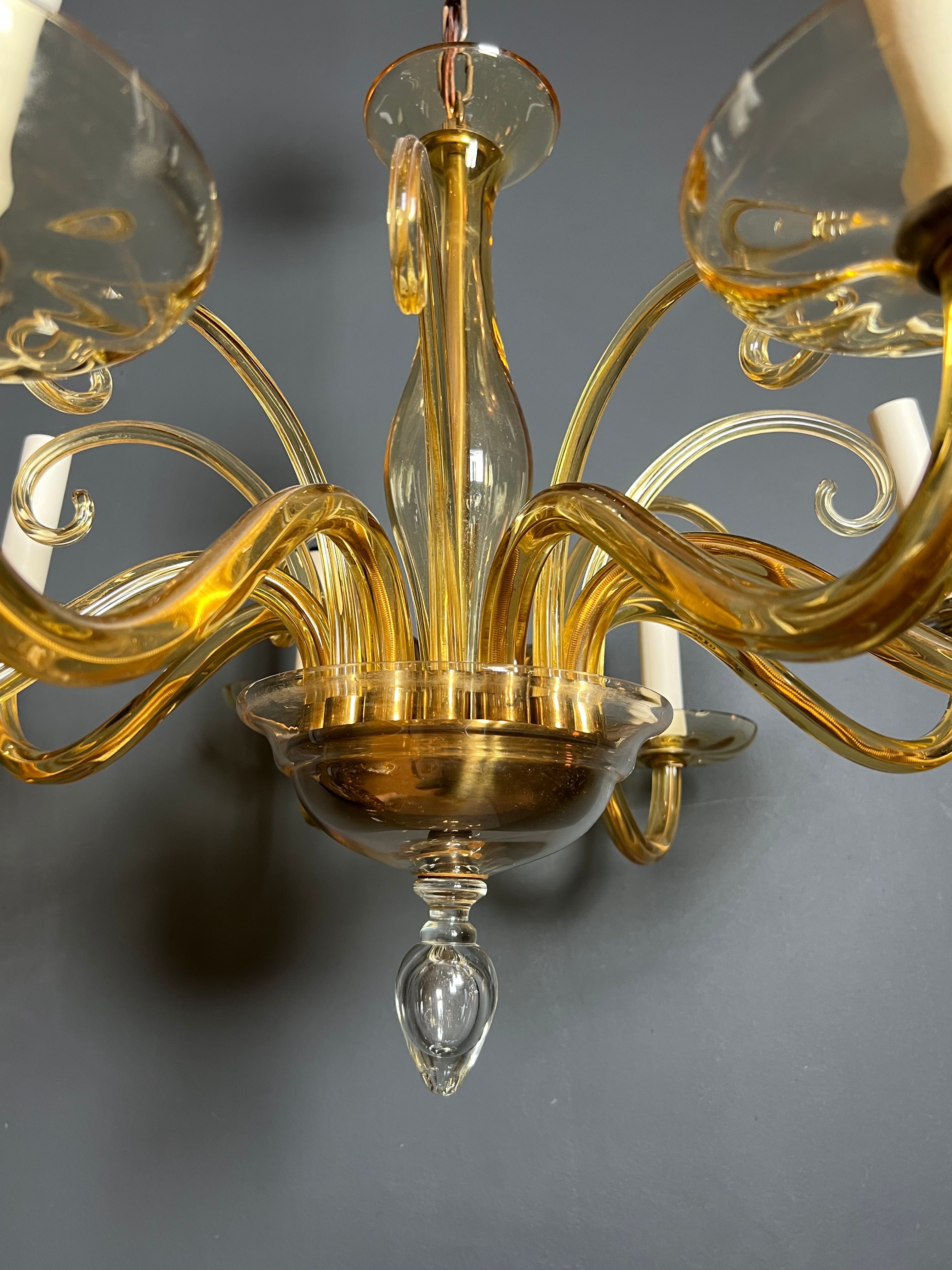 Orange Murano crystal chandelier with 8 light arms. Italian work. Circa 1970.