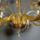 Orange Murano crystal chandelier with 8 light arms. Italian work. Circa 1970.