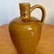 Vintage beige ceramic pitcher jug bottle