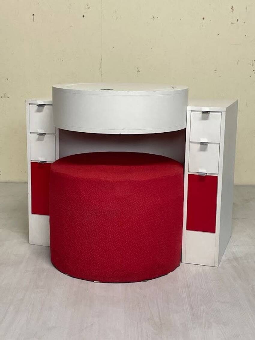 Bathroom toilet with a 70s pouf.