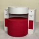 Bathroom toilet with a 70s pouf.