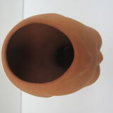 Terracotta vase: child's head