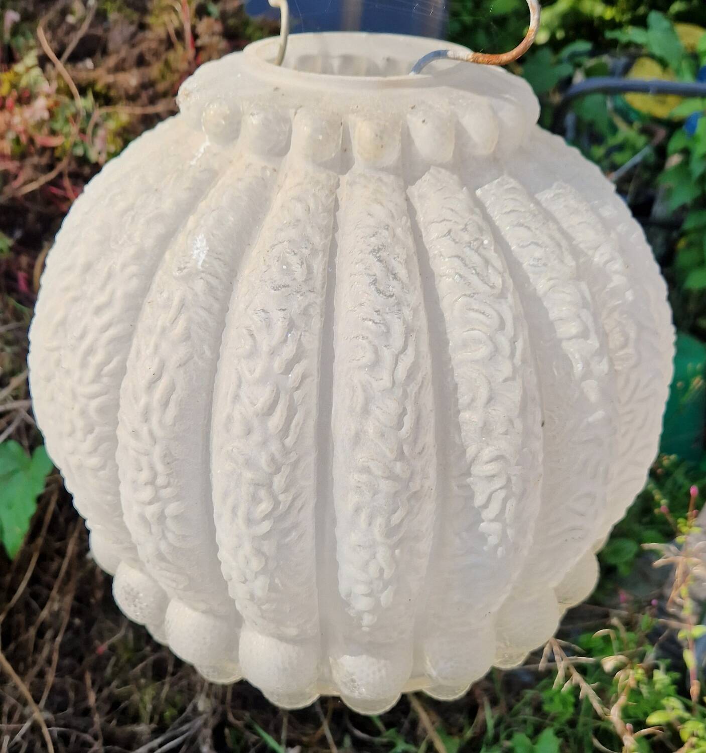 Molded glass hanging globe