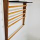 Rare coat rack by Carl Auböck with hat rack, cabinet, brass, walnut and beech, 1950s.