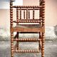 Antique Bobbin armchair with straw seat