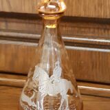 Moulded blown glass decanter with equestrian fox hunting décor, belle époque