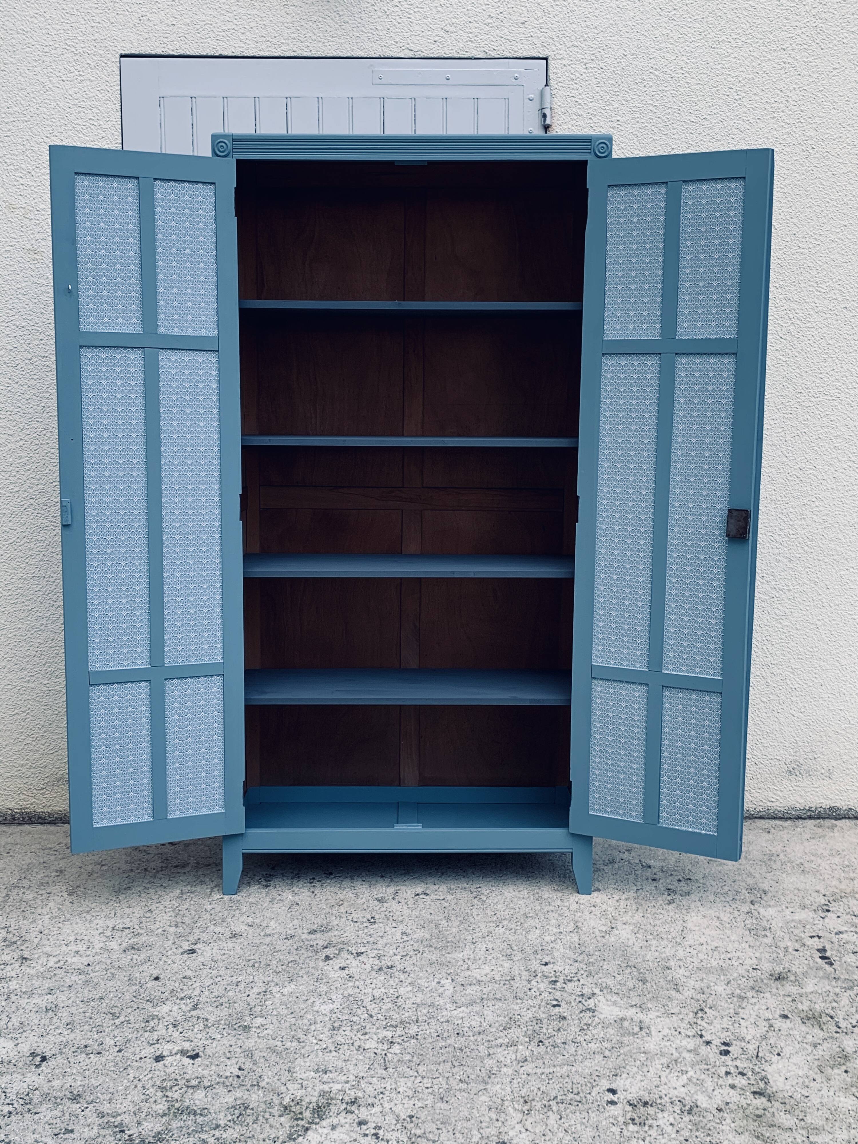 Greyish blue Parisian wardrobe 1940