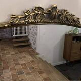 Large gilded mirror with pediment