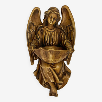 Old wooden angel font