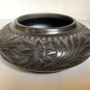 Black pottery catchall worked from Marginea, Romania.