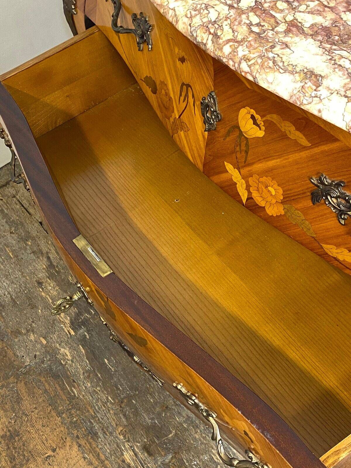 Louis XV curved commode, marble top, bronze fittings and marquetry.