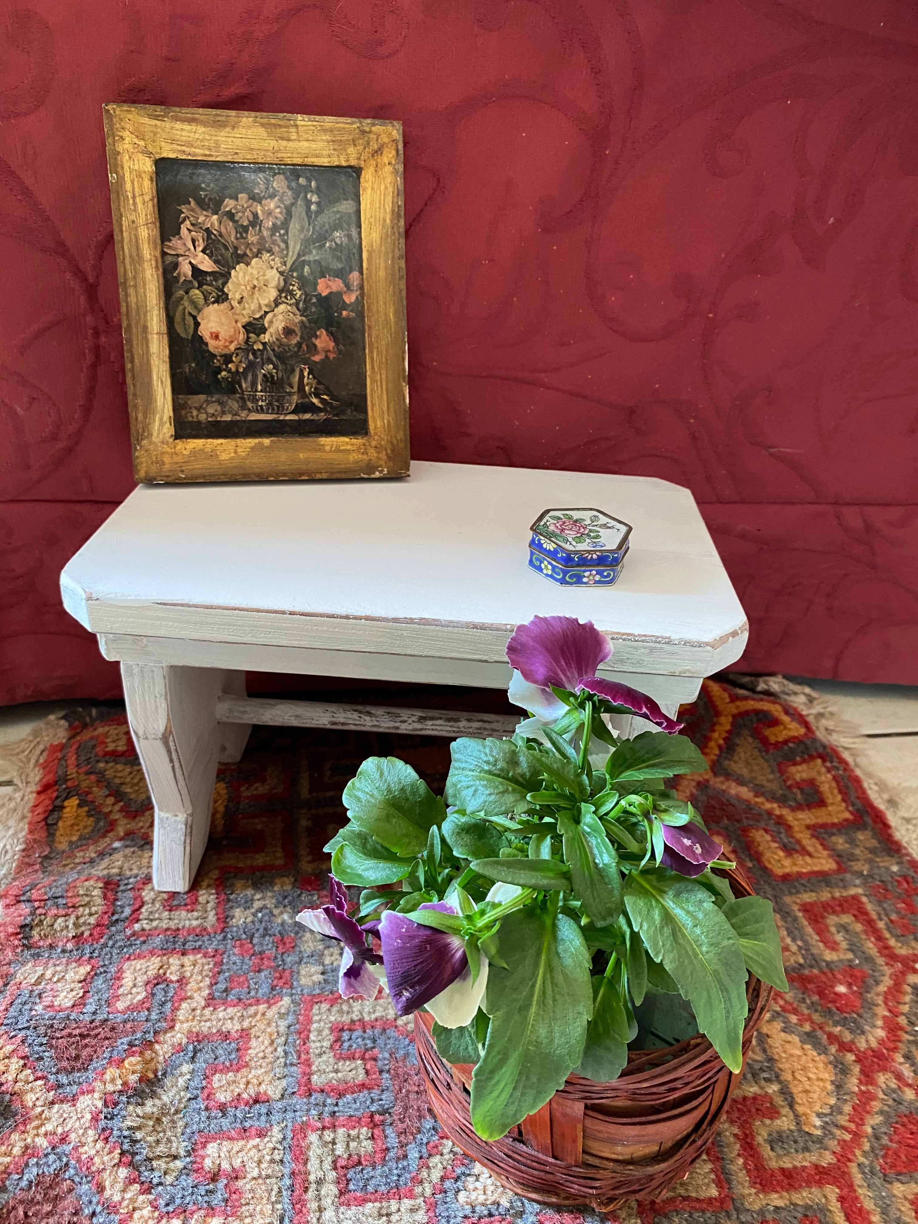 Patinated wooden footrest.