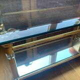 Table Hollywood Regency en laiton et verre avec têtes d'éléphants
