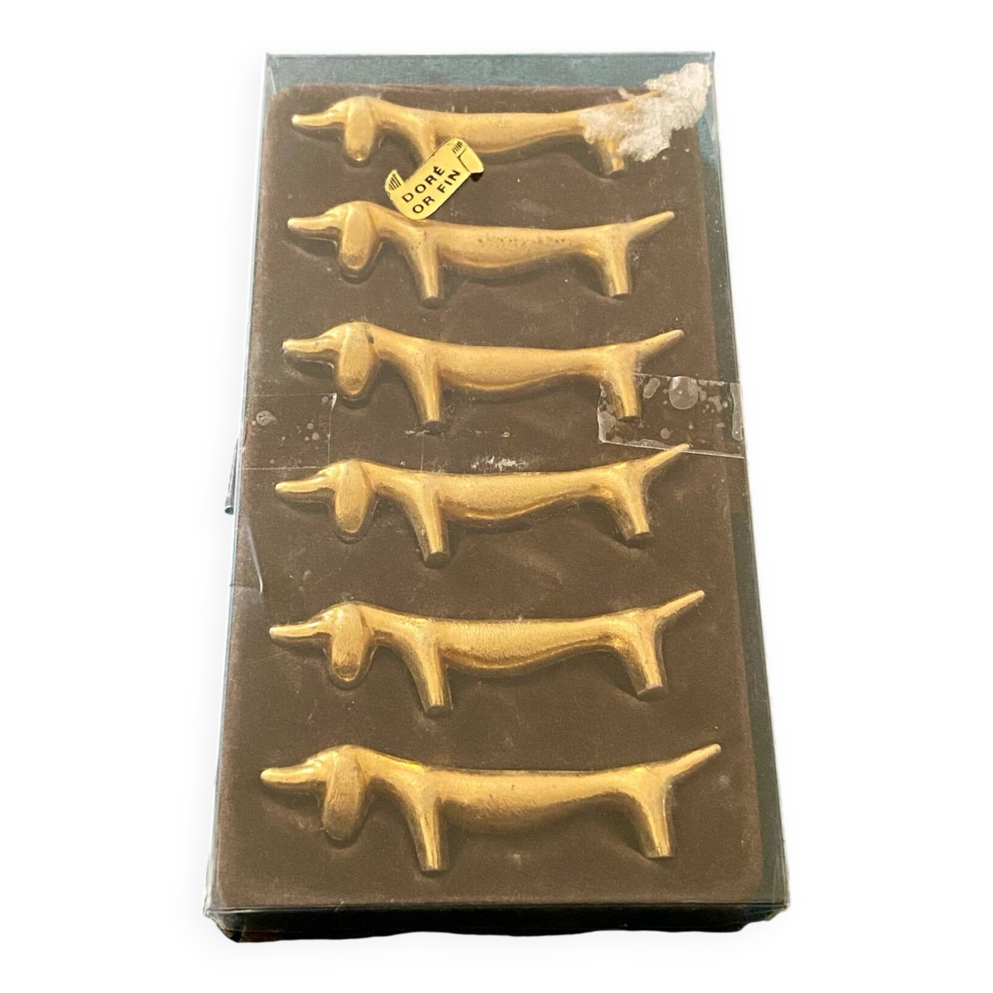6 dog-shaped knife holders in fine gold-plated metal