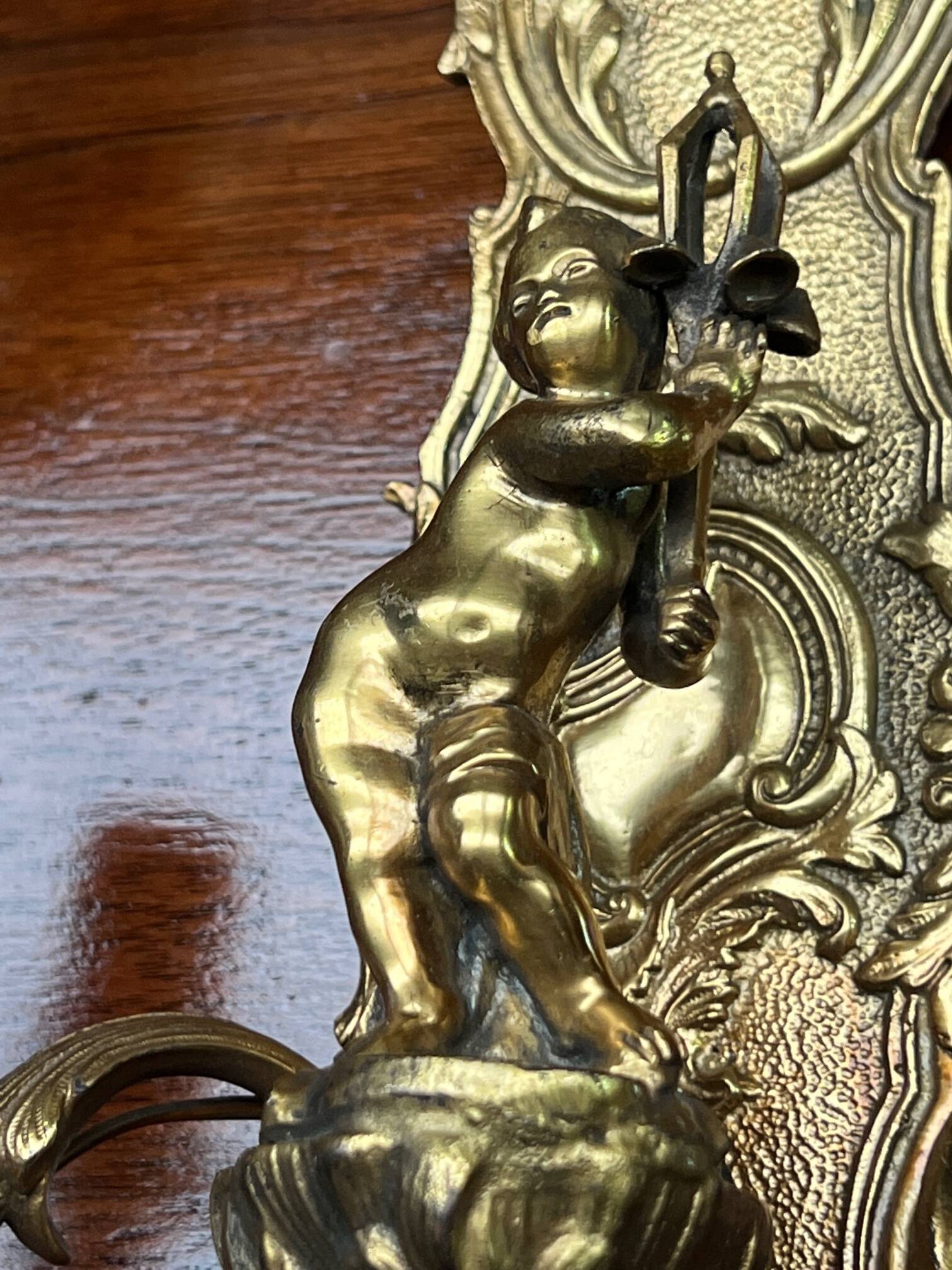 Pair of Louis XV style wall lights. Solid gilded bronze.