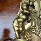 Pair of Louis XV style wall lights. Solid gilded bronze.
