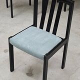 Set of 4 modernist black chairs with light blue ribbed fabric