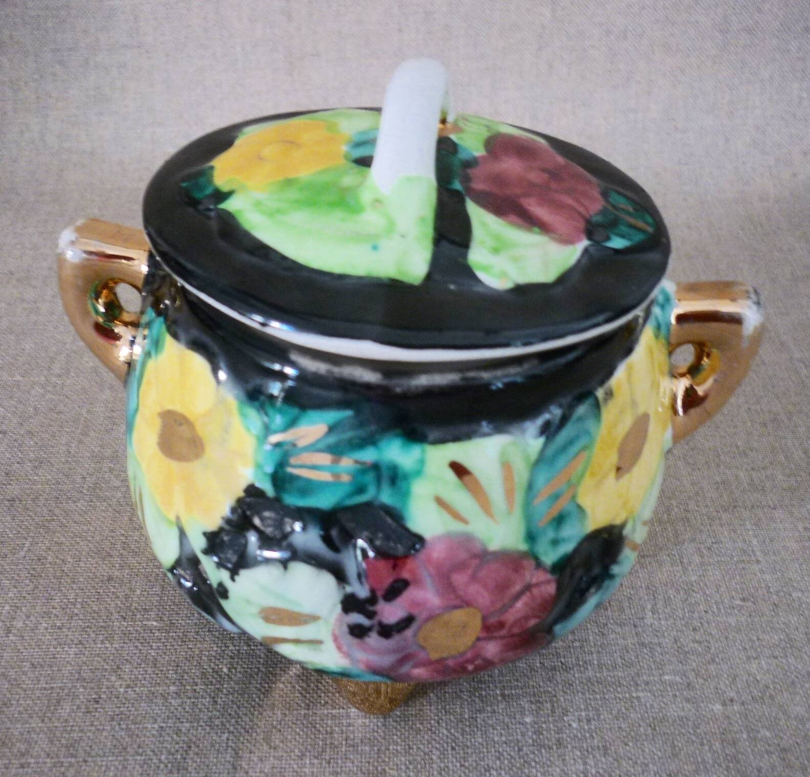 Multicolored ceramic covered tripod pot
