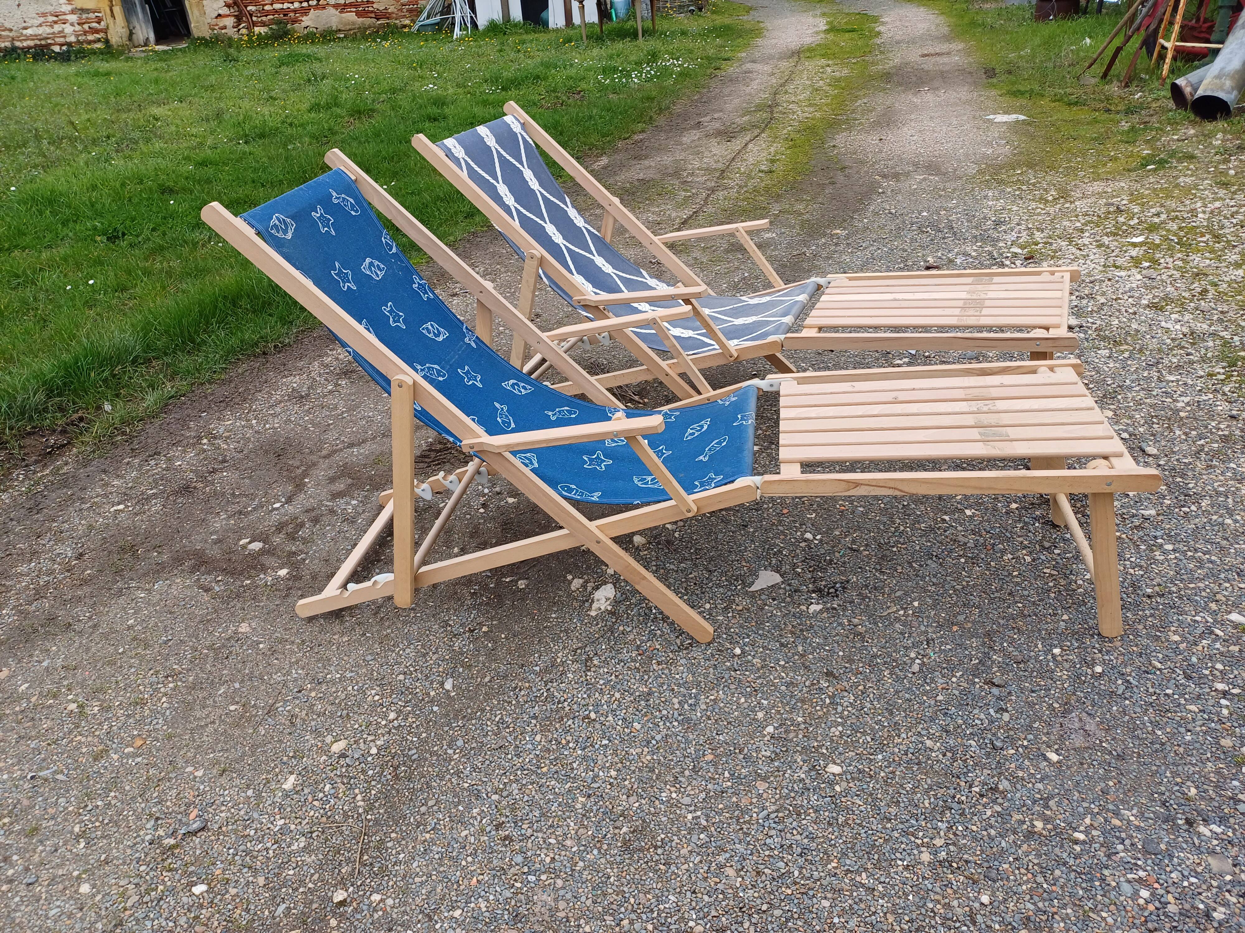 Pair of wood and fabric long chairs